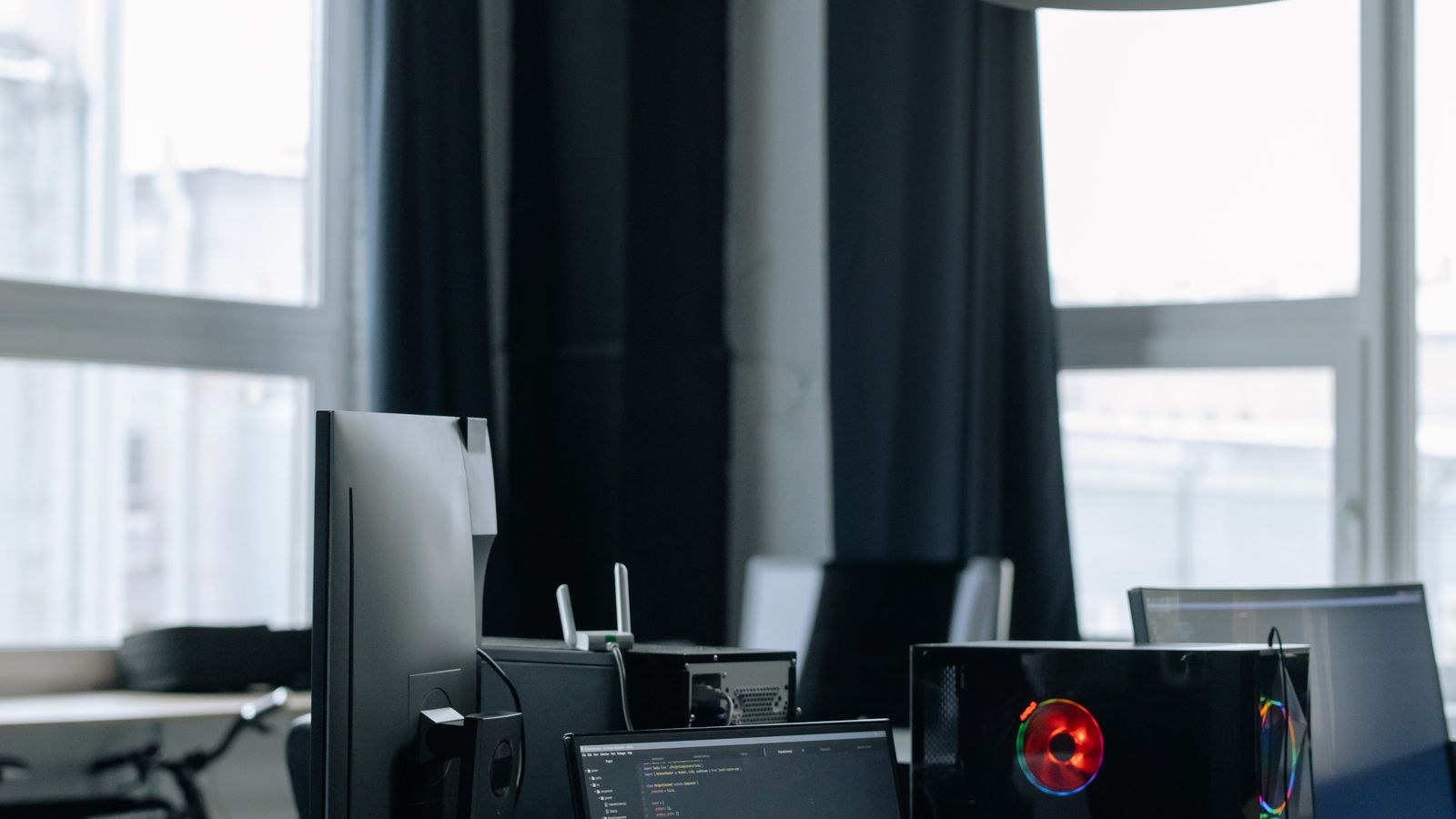 Dual monitor setup on a desk showing contrast and color differences