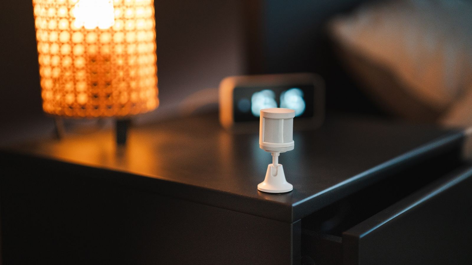 Ceiling mounted motion detector sensor in a modern interior space