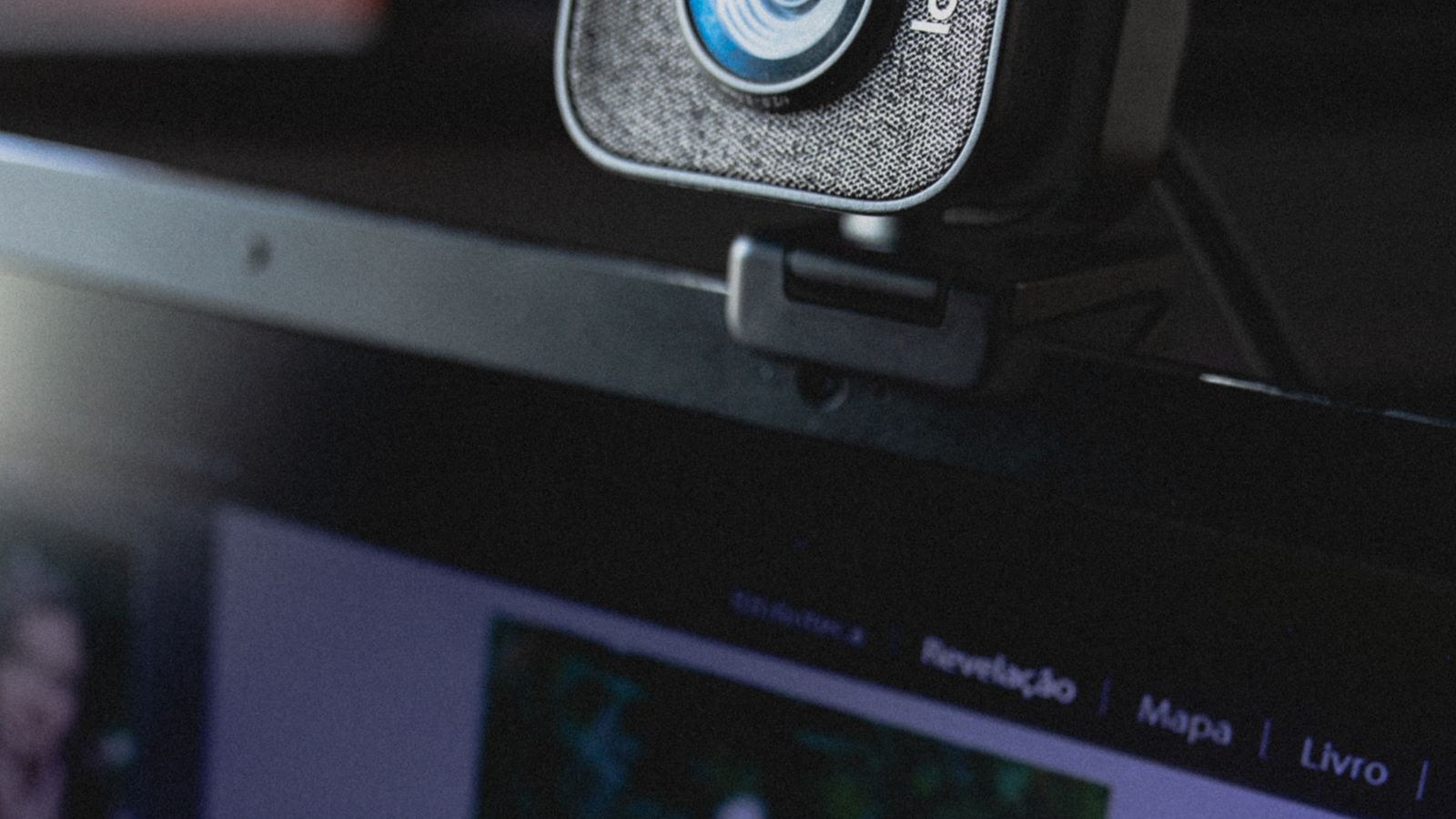 How to Mount a Webcam Above or Behind a Monitor