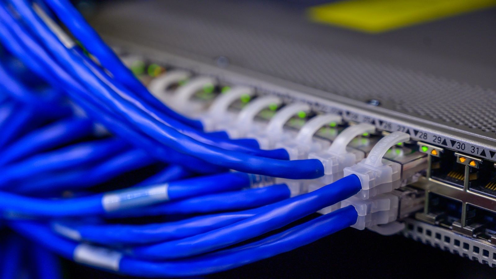 Network switch and patch panel supplying Power over Ethernet to ceiling access points