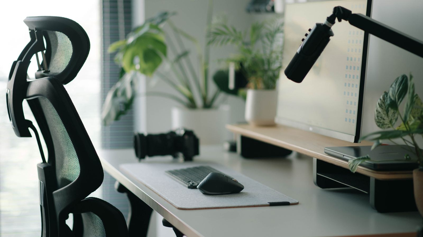 Ergonomic office chair with adjustable back in a modern workspace