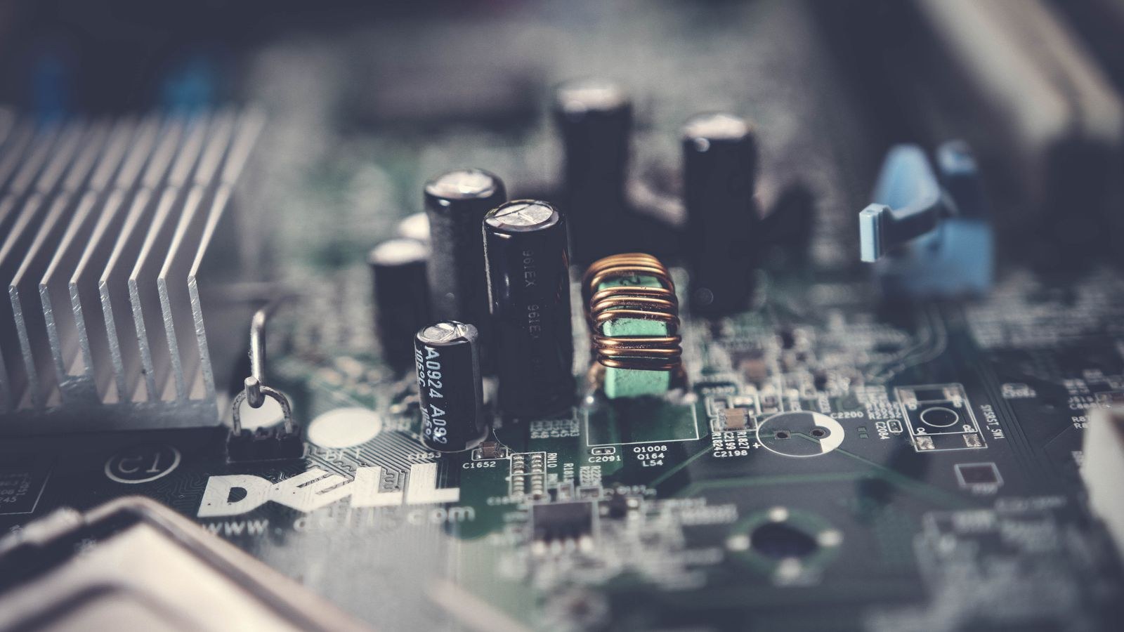 Close-up of a motherboard with CPU socket and memory slots
