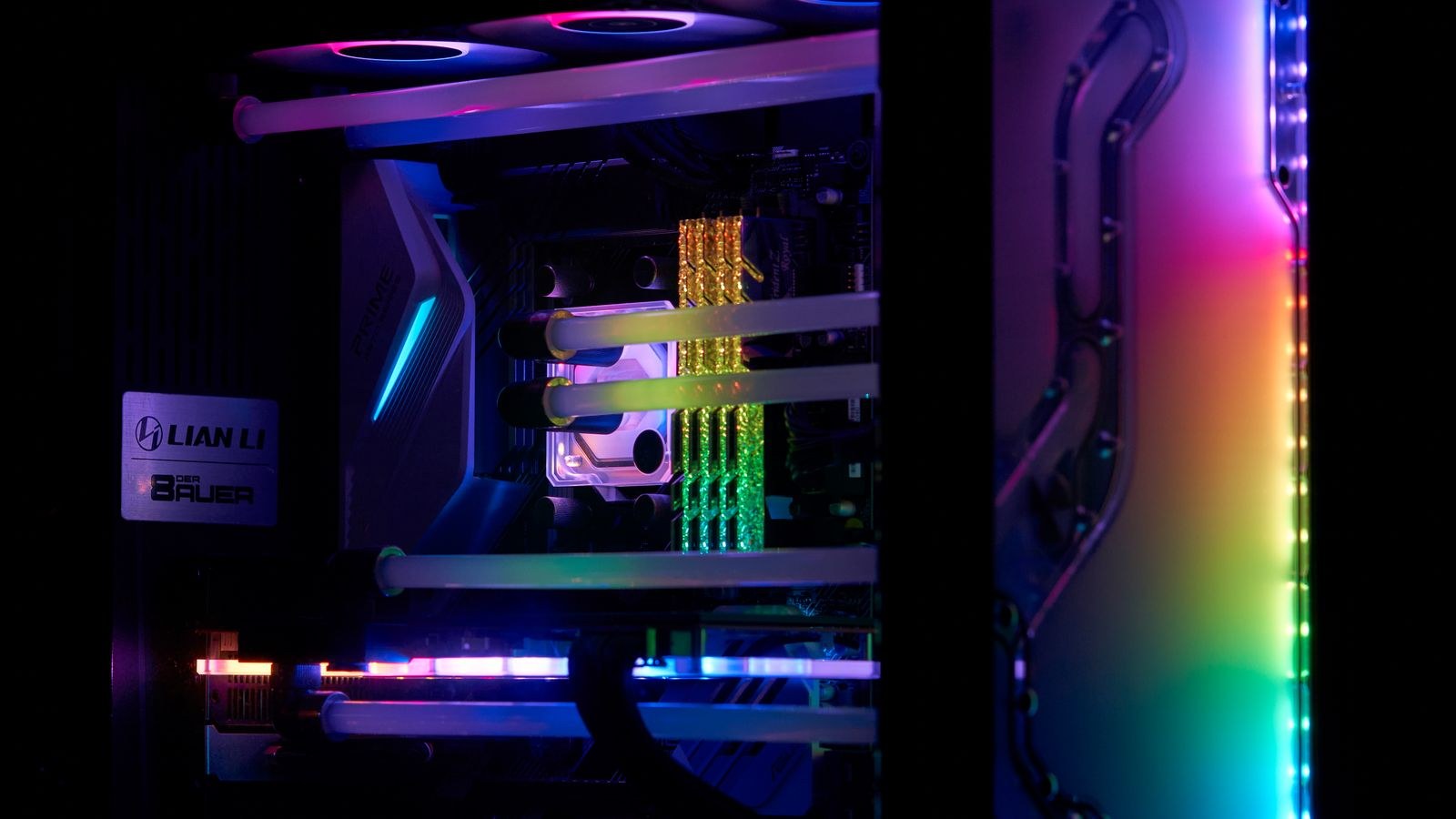 Close-up of illuminated PC case fans and RGB cooling components
