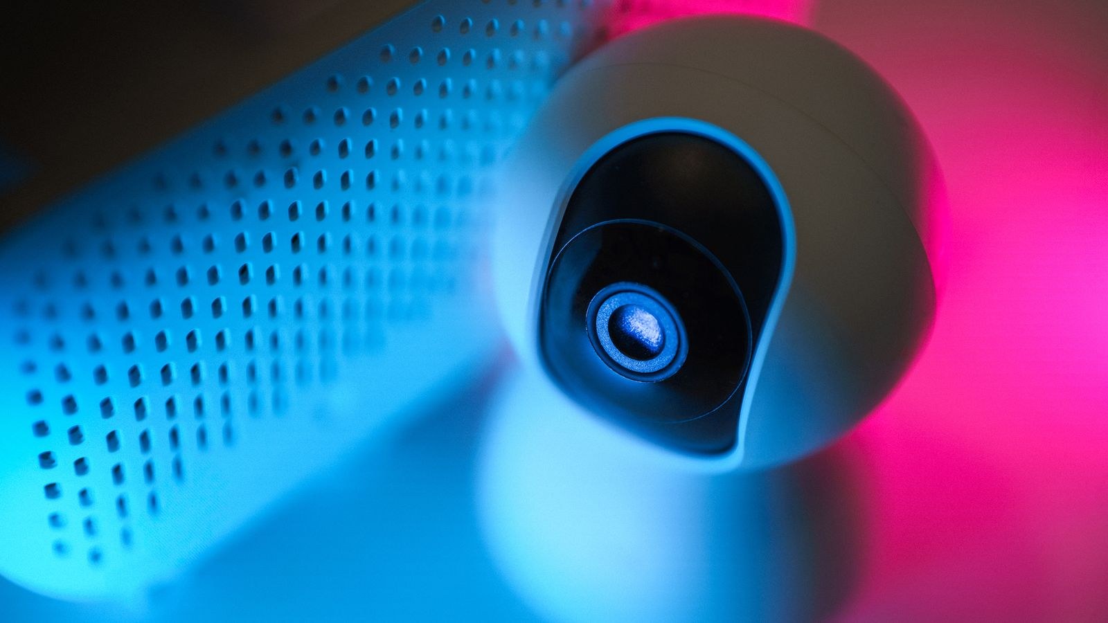 Network security camera mounted outdoors powered by a PoE cable run