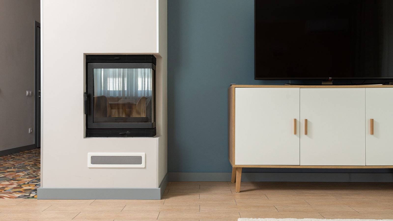 Modern TV on a stand in a contemporary apartment living room
