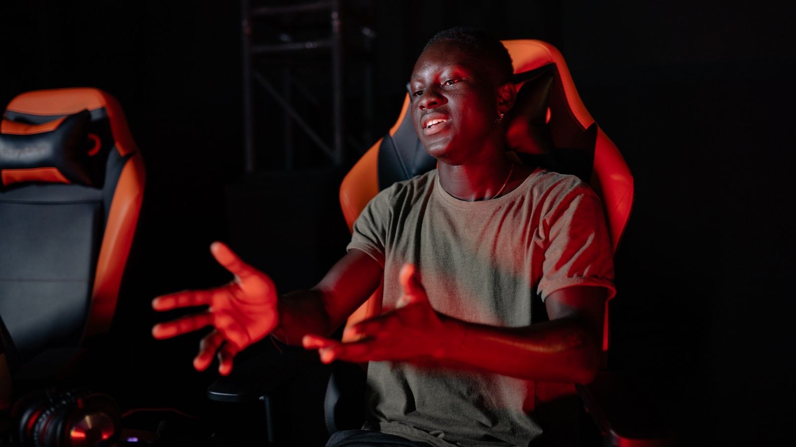 Gamer seated in a supportive gaming chair during a long session