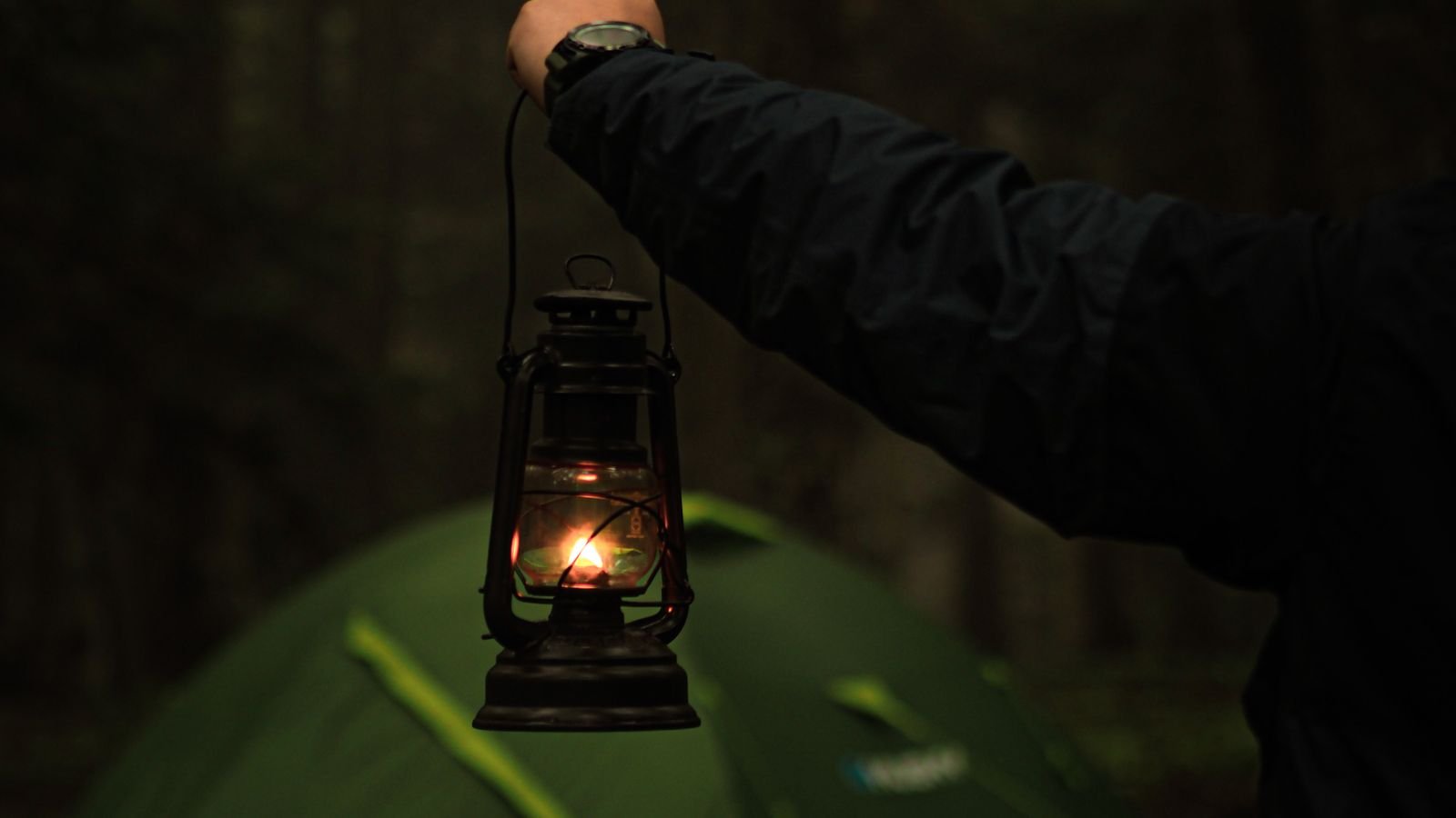 Portable battery-powered light illuminating a dark space