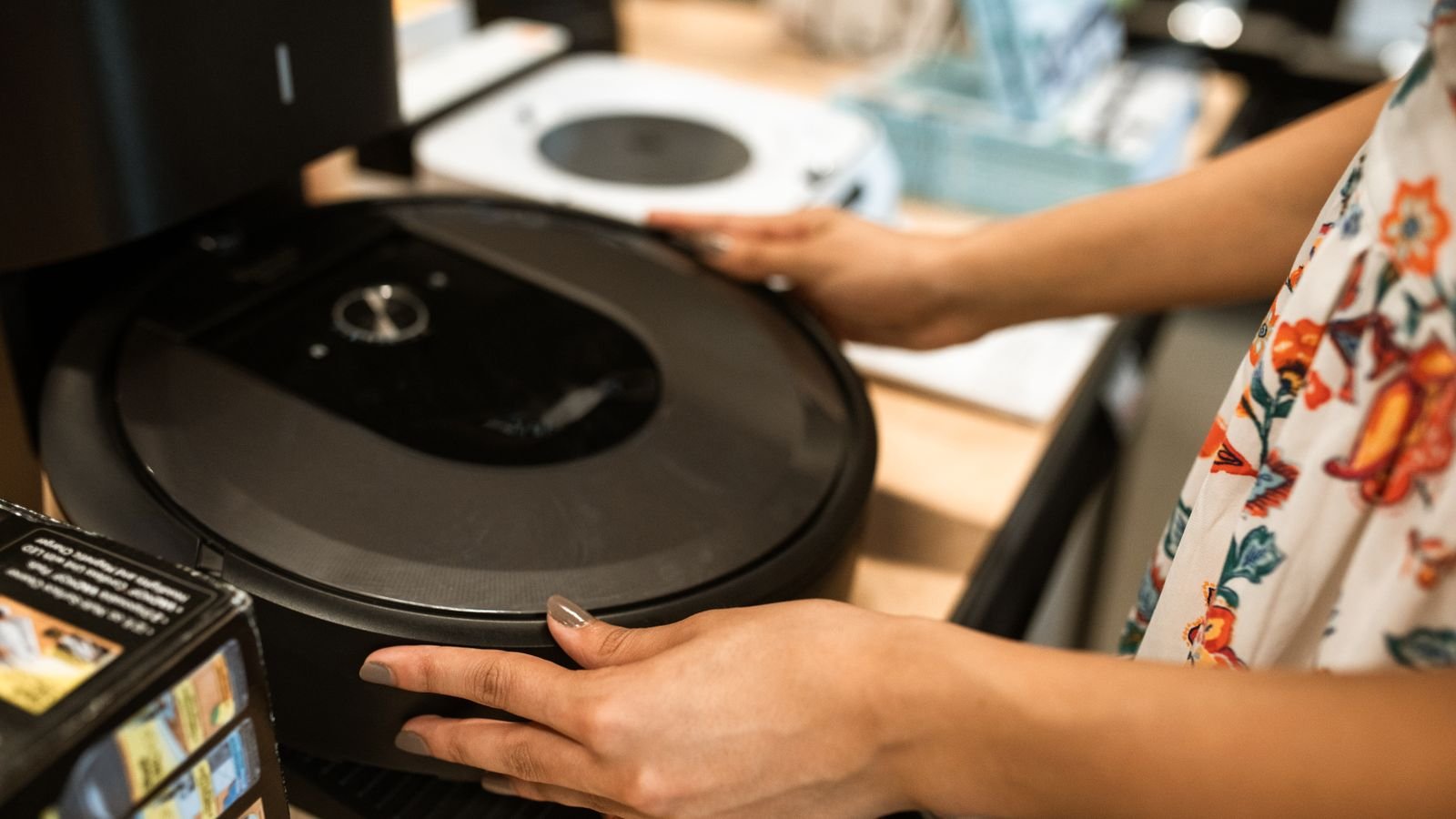Robot vacuum cleaning along a carpet edge in a home