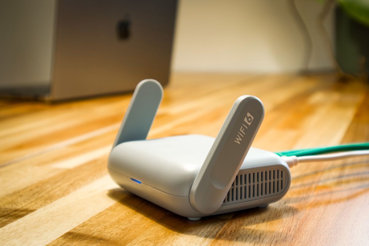 Wireless router with multiple antennas on a desk