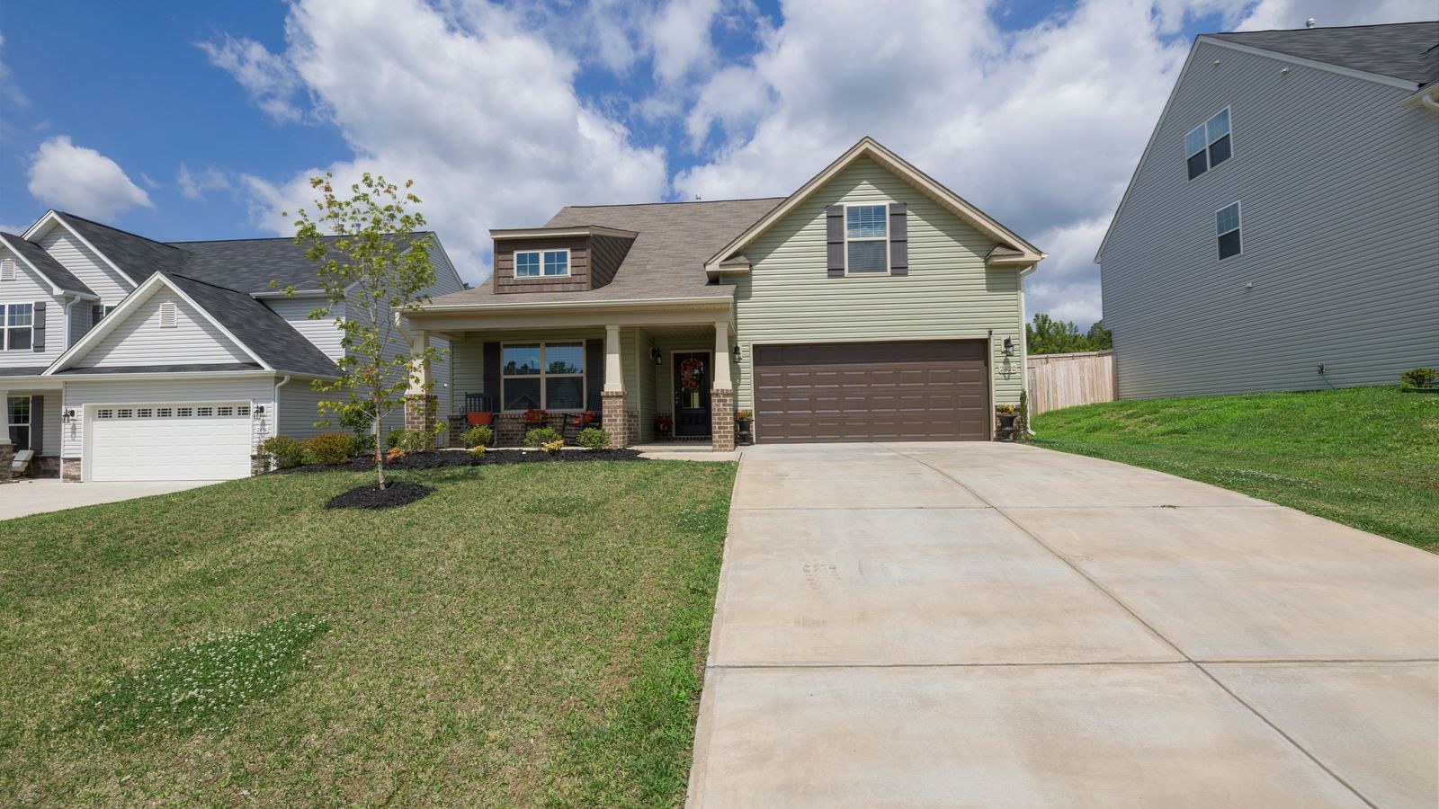 Suburban house exterior and driveway typically covered by a security camera