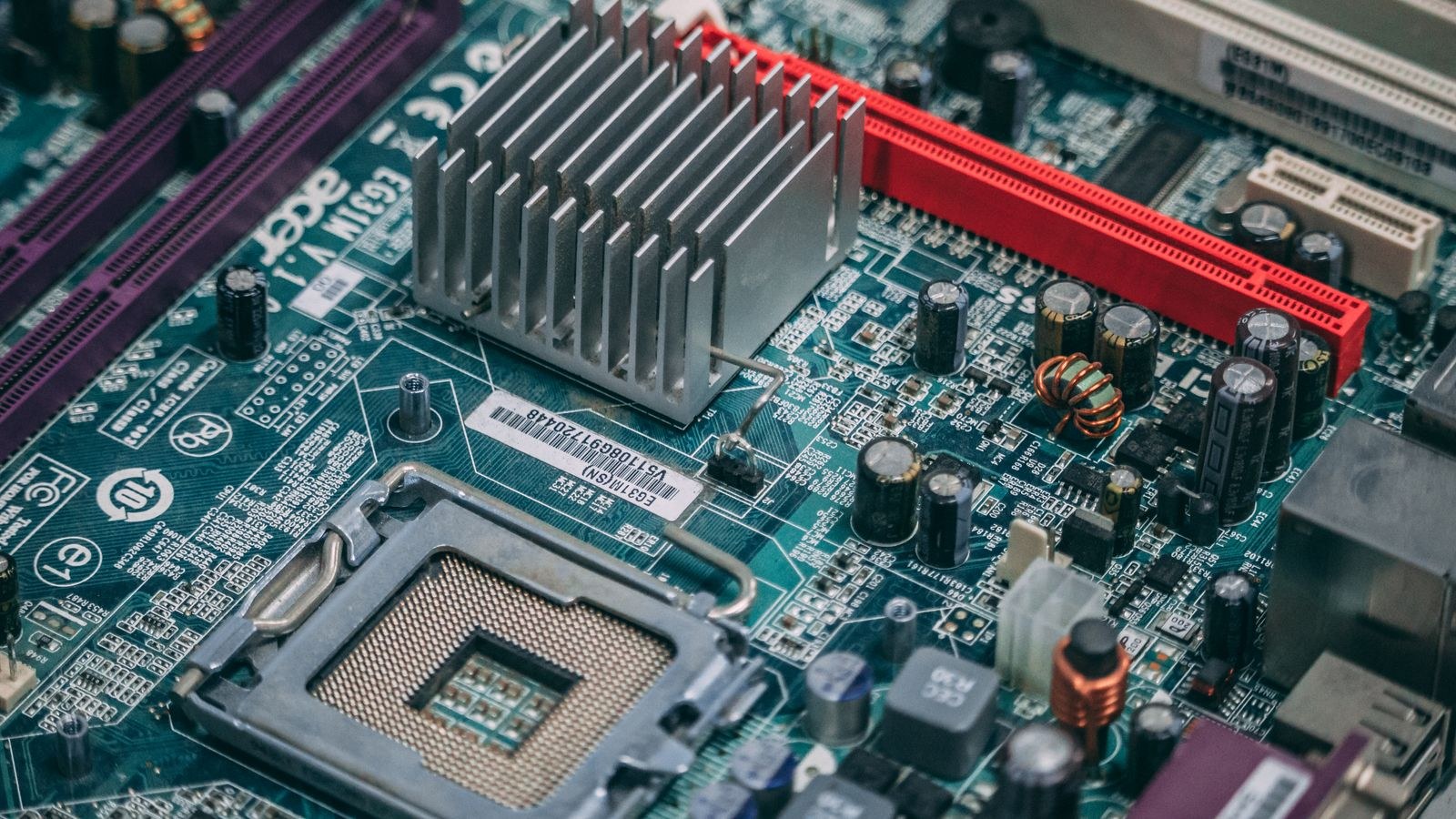 Modern computer motherboard showing fan headers and components