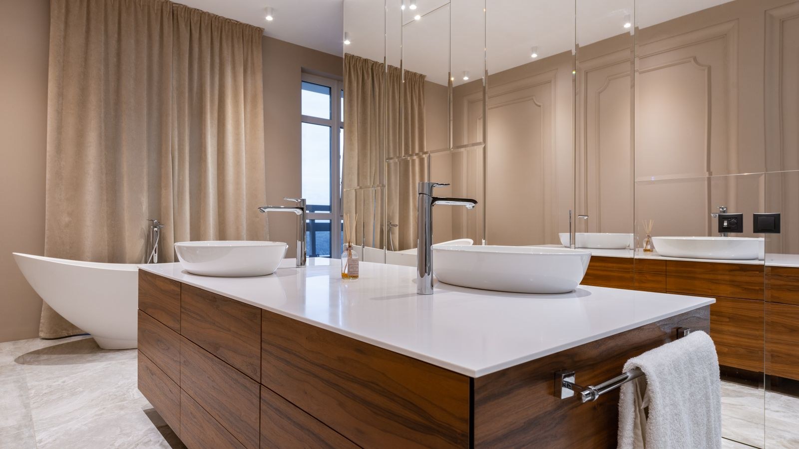 Minimalist bathroom with white sink and mirrored cabinet in a well ventilated room