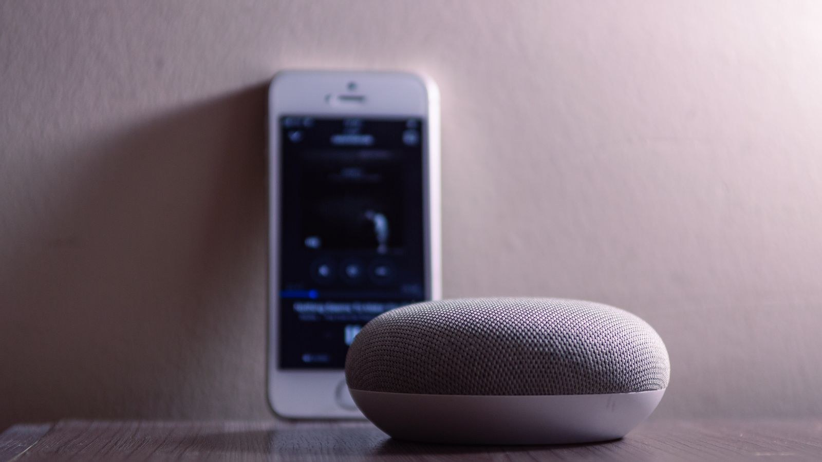Smart speaker on a shelf in a family living room