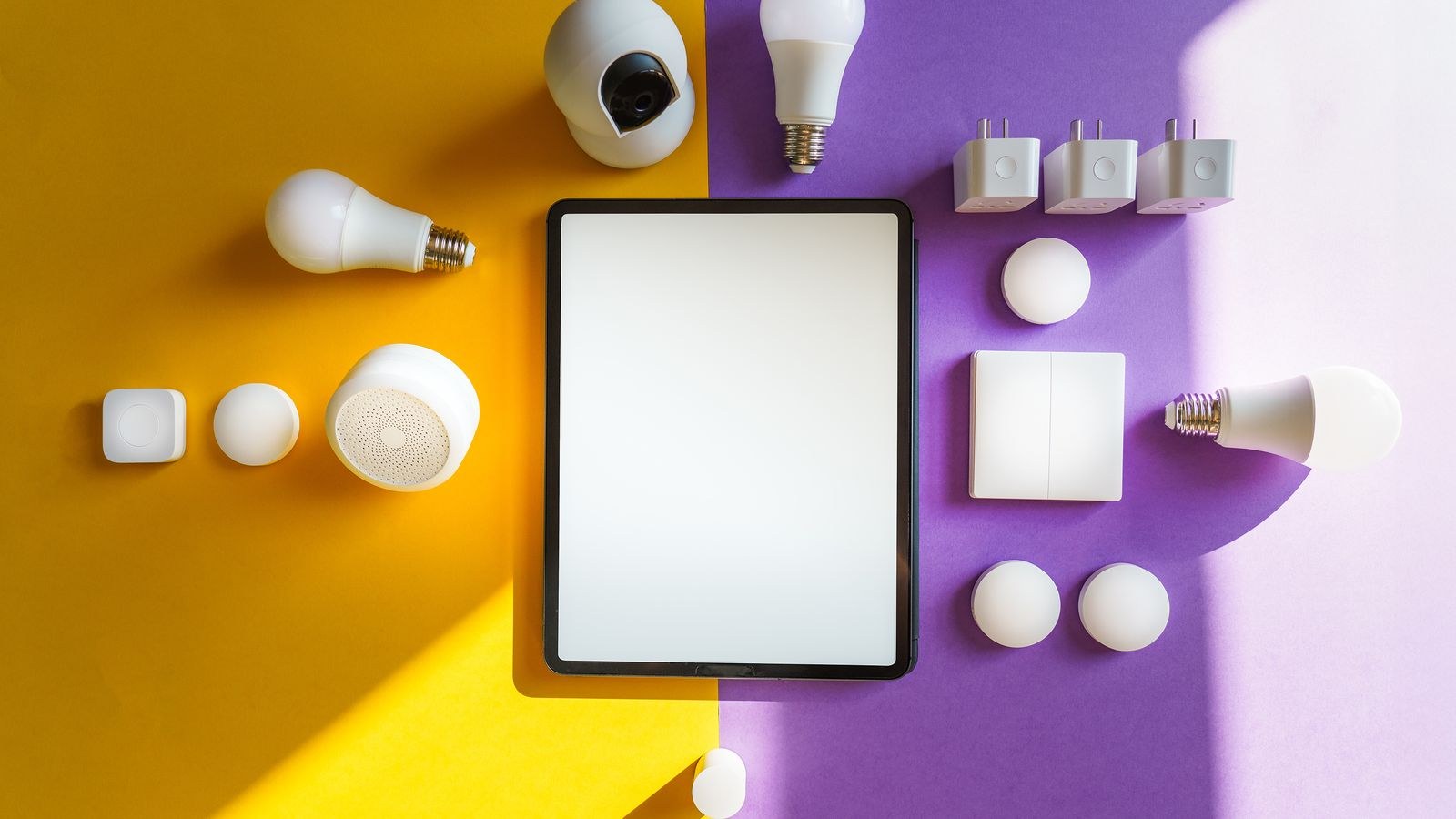 Smart home hub and connected devices arranged on a shelf in a living room