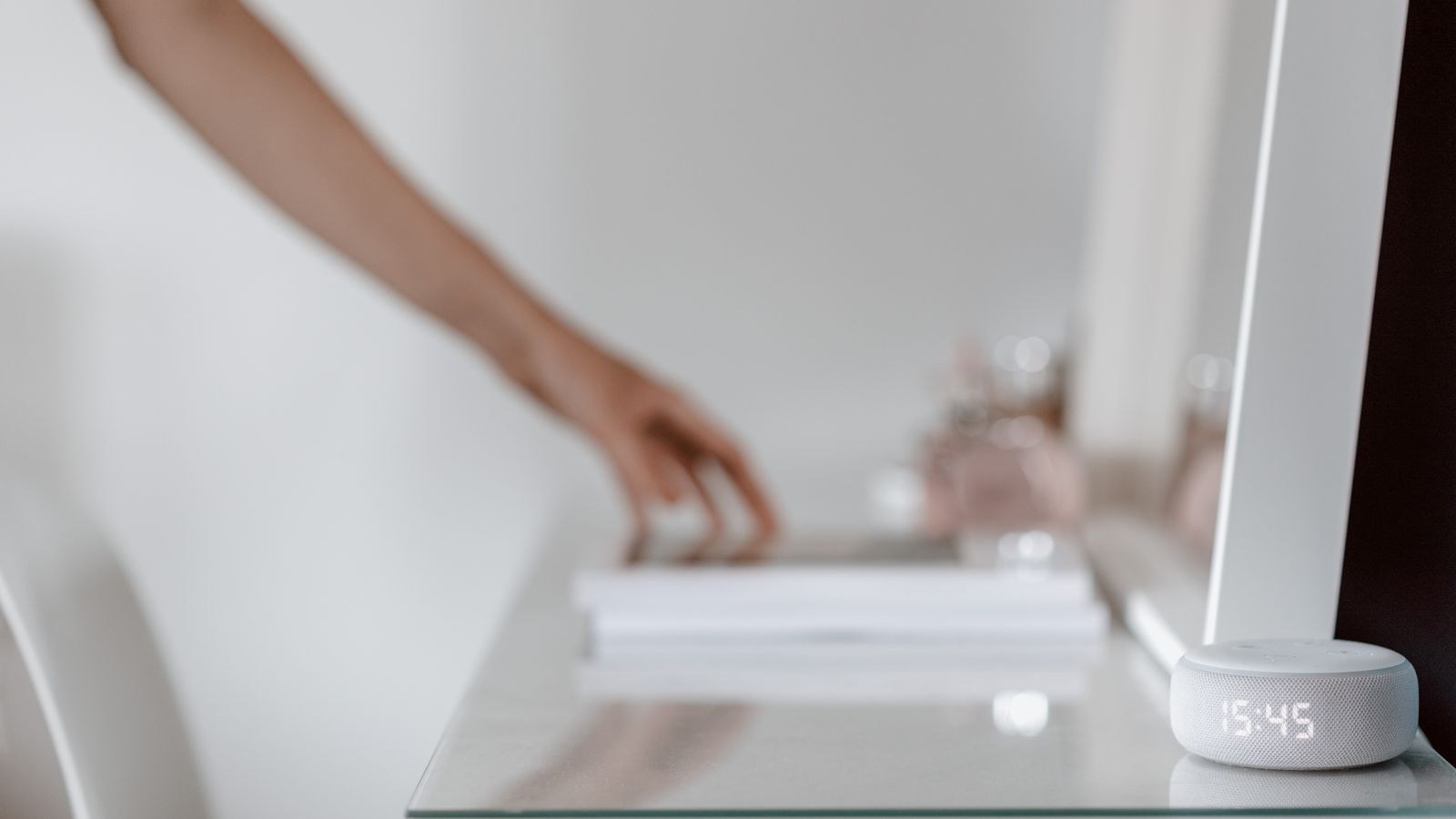 Inexpensive smart speaker on a desk used as a budget smart home hub