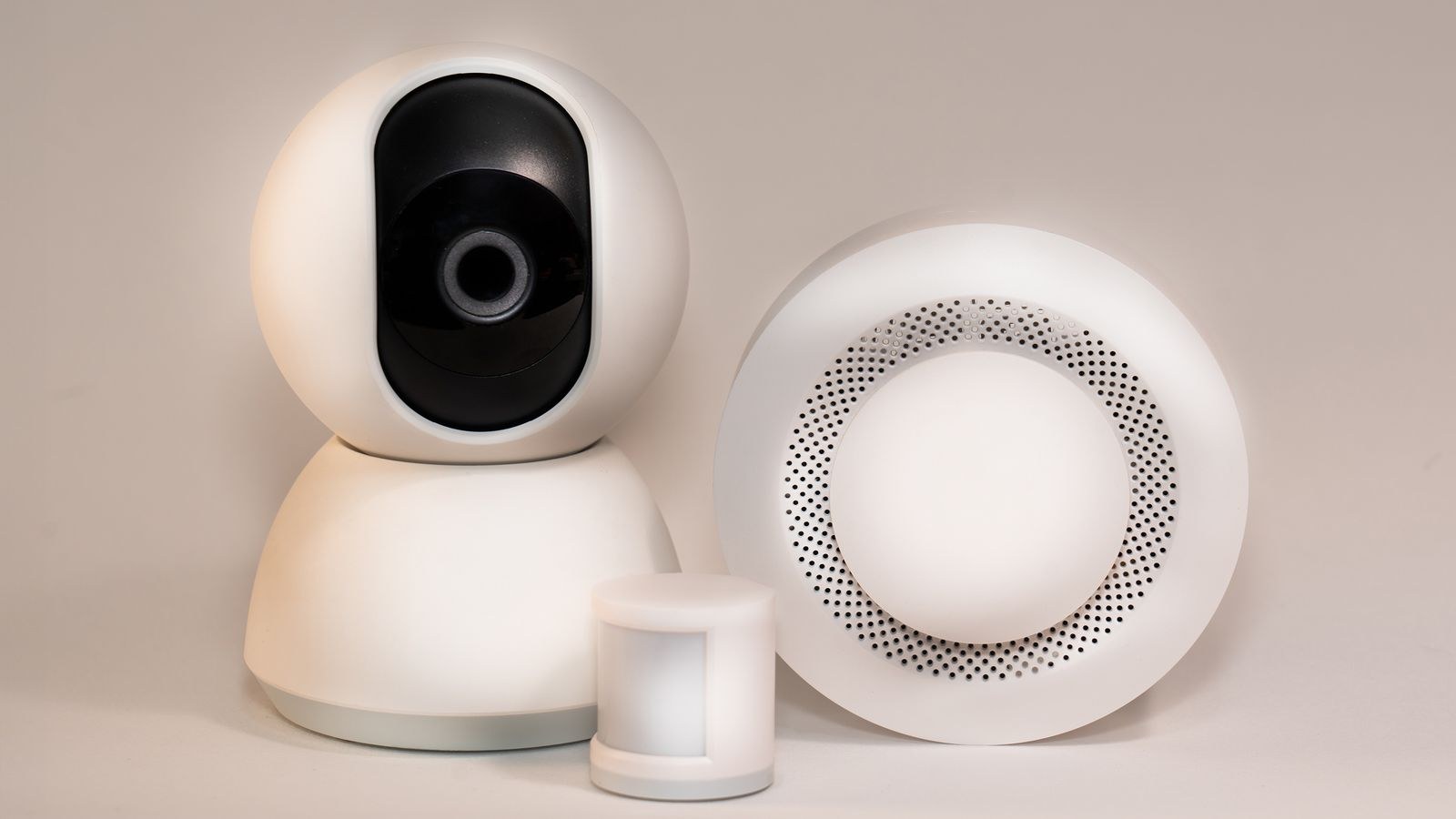 Collection of smart home security devices including cameras and sensors