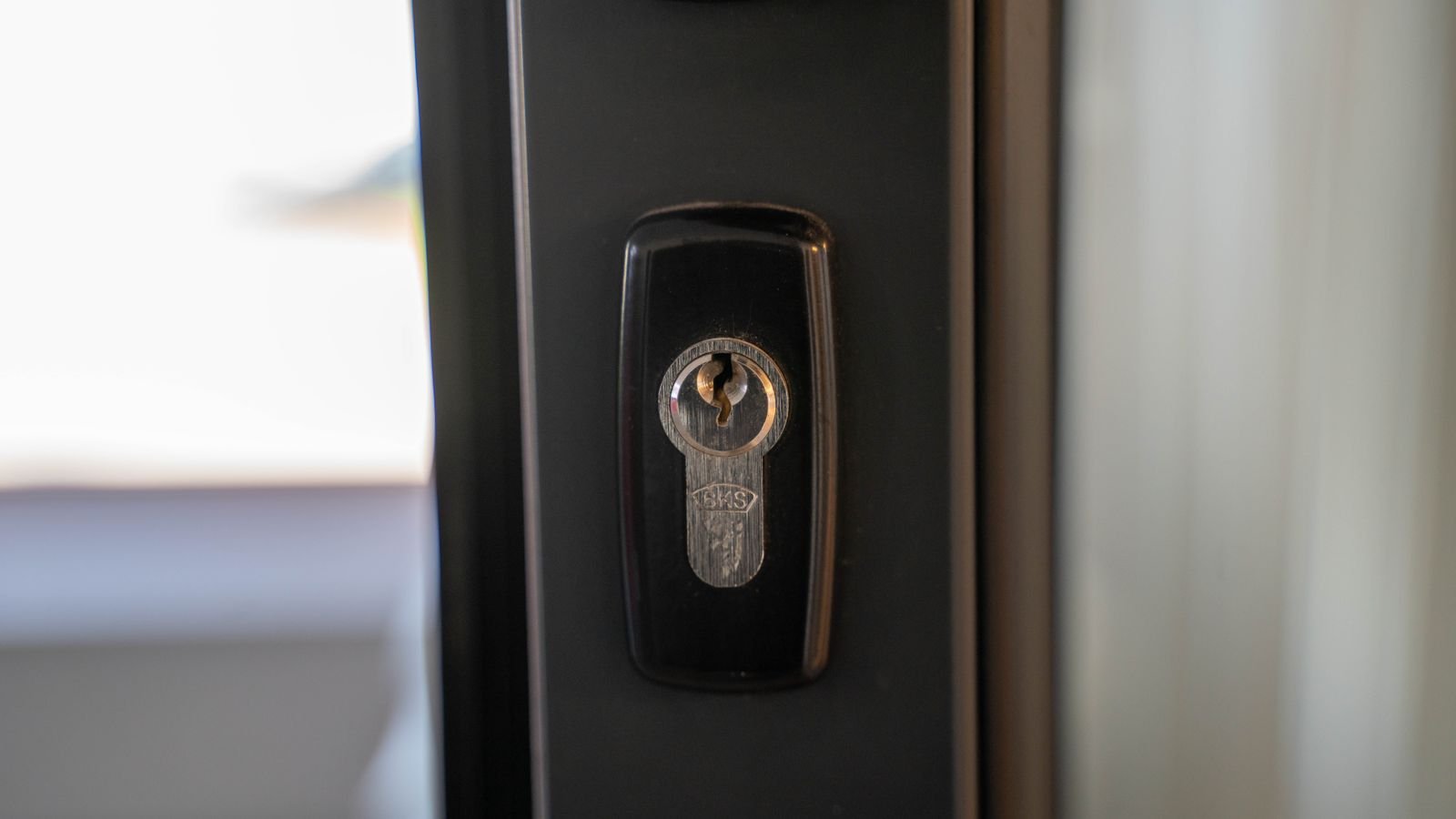 Keyless entry deadbolt lock on a wooden entry door