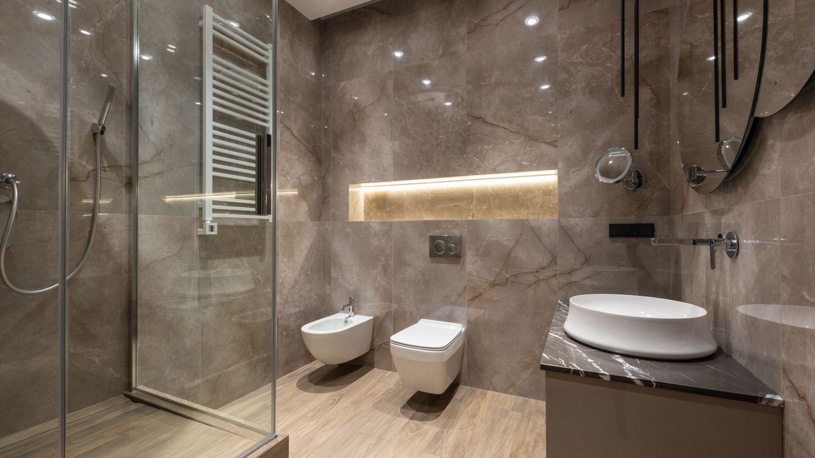 Clean modern bathroom interior with toilet and fixtures