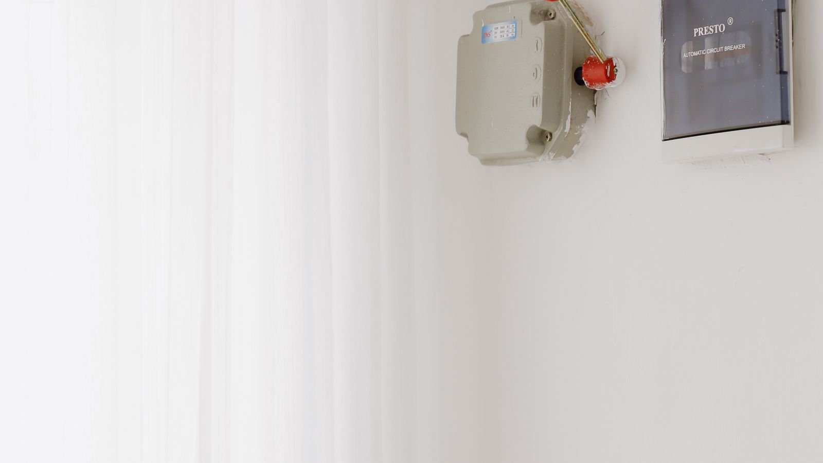 Ceiling mounted smoke detector and alarm device in a house