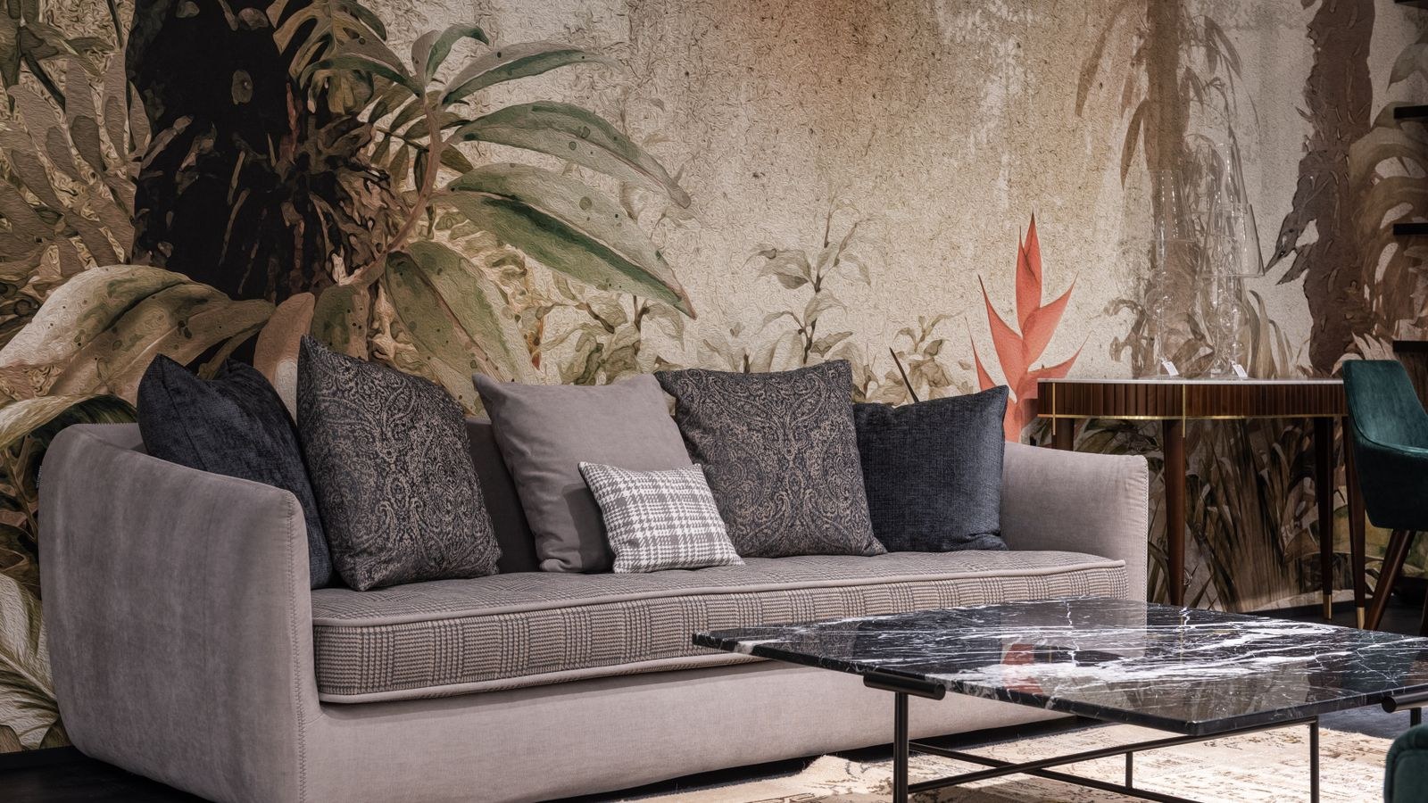 Comfortable sofa with cushions positioned in a measured living room layout