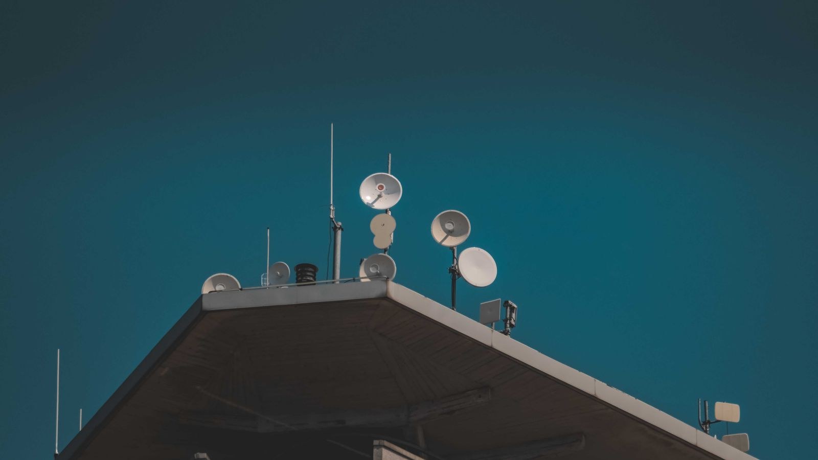 Rural property with satellite communication dish for home broadband access