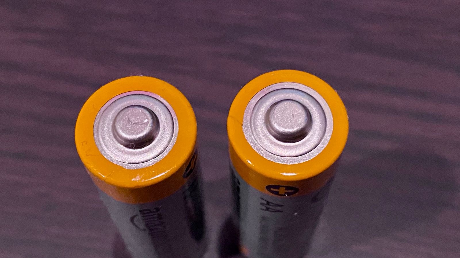 Used batteries collected in a container ready for recycling