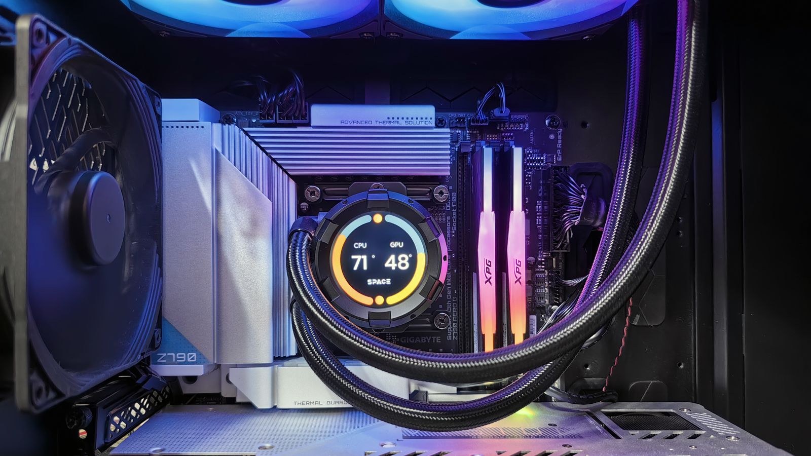 RGB cooling fans and graphics card running under full load inside a PC case