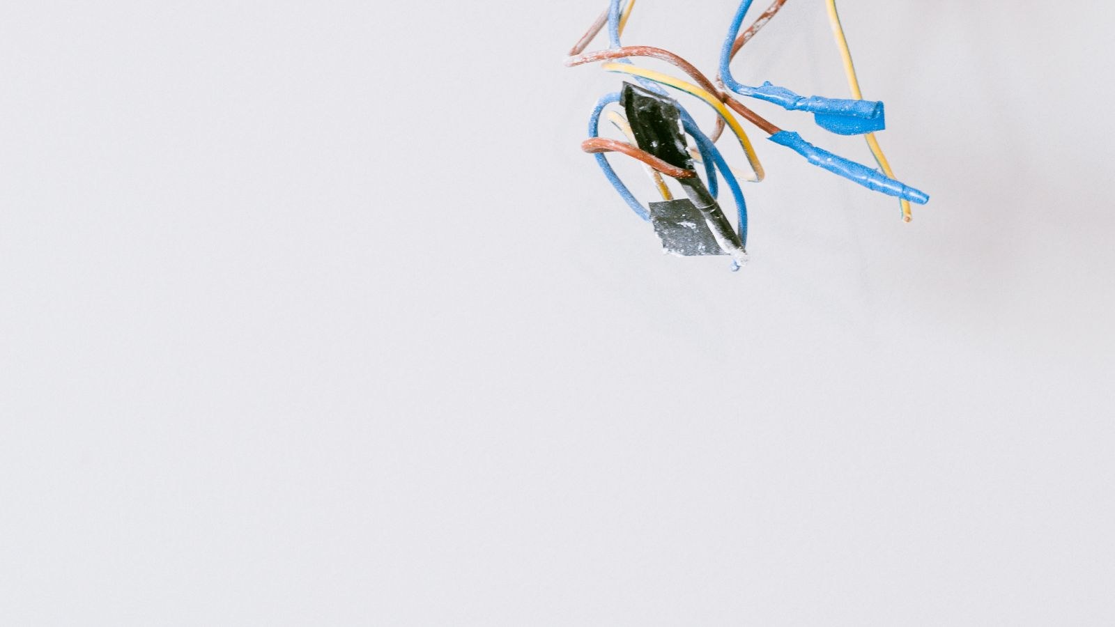 Electrical conductors and wire connectors inside a switch box during rewiring