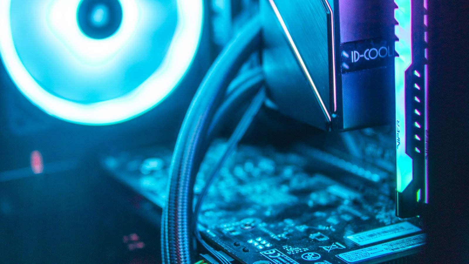 Vibrant RGB lighting on computer hardware components inside a desktop case