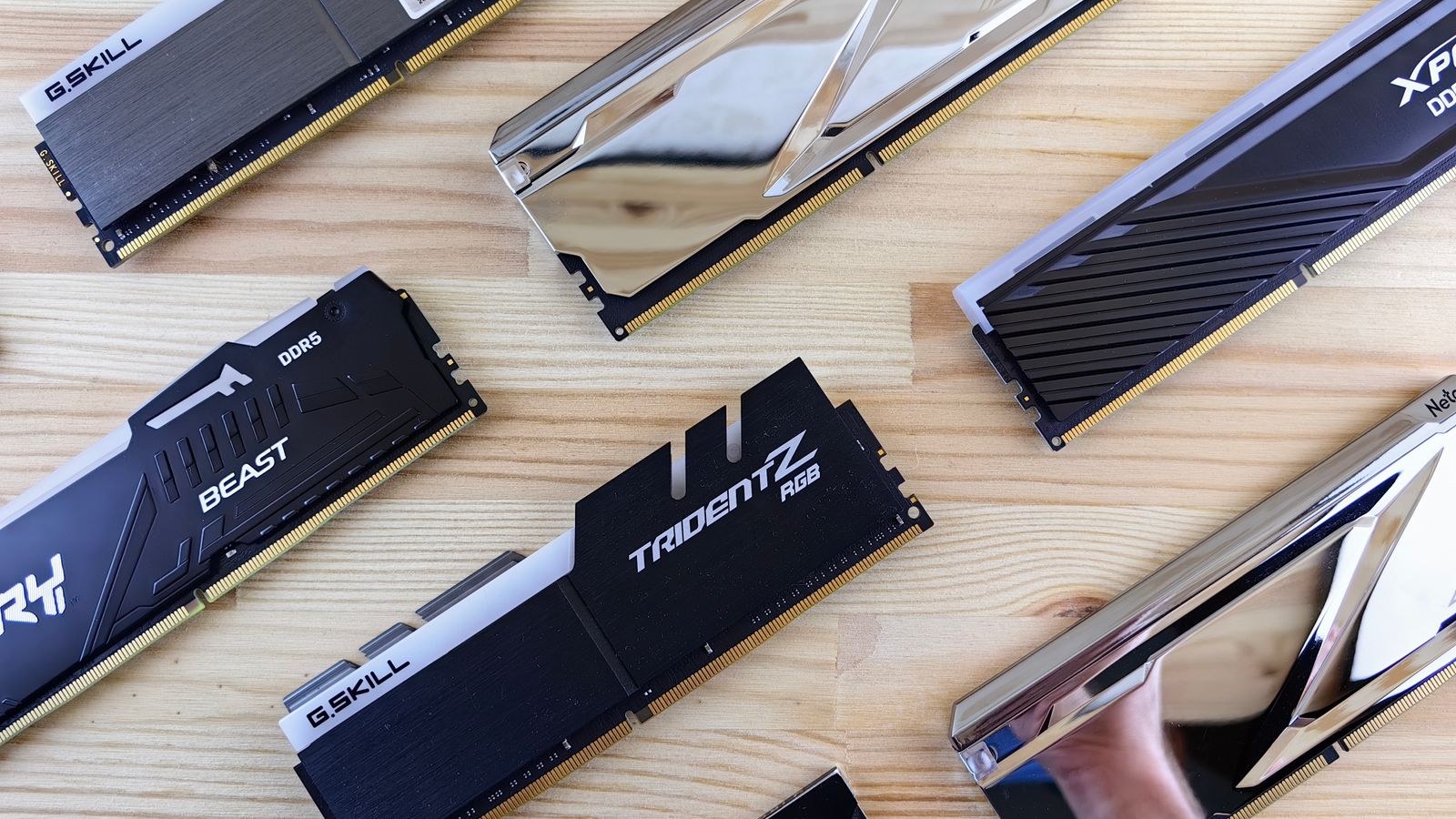 High performance RAM modules on a wooden surface ready for installation