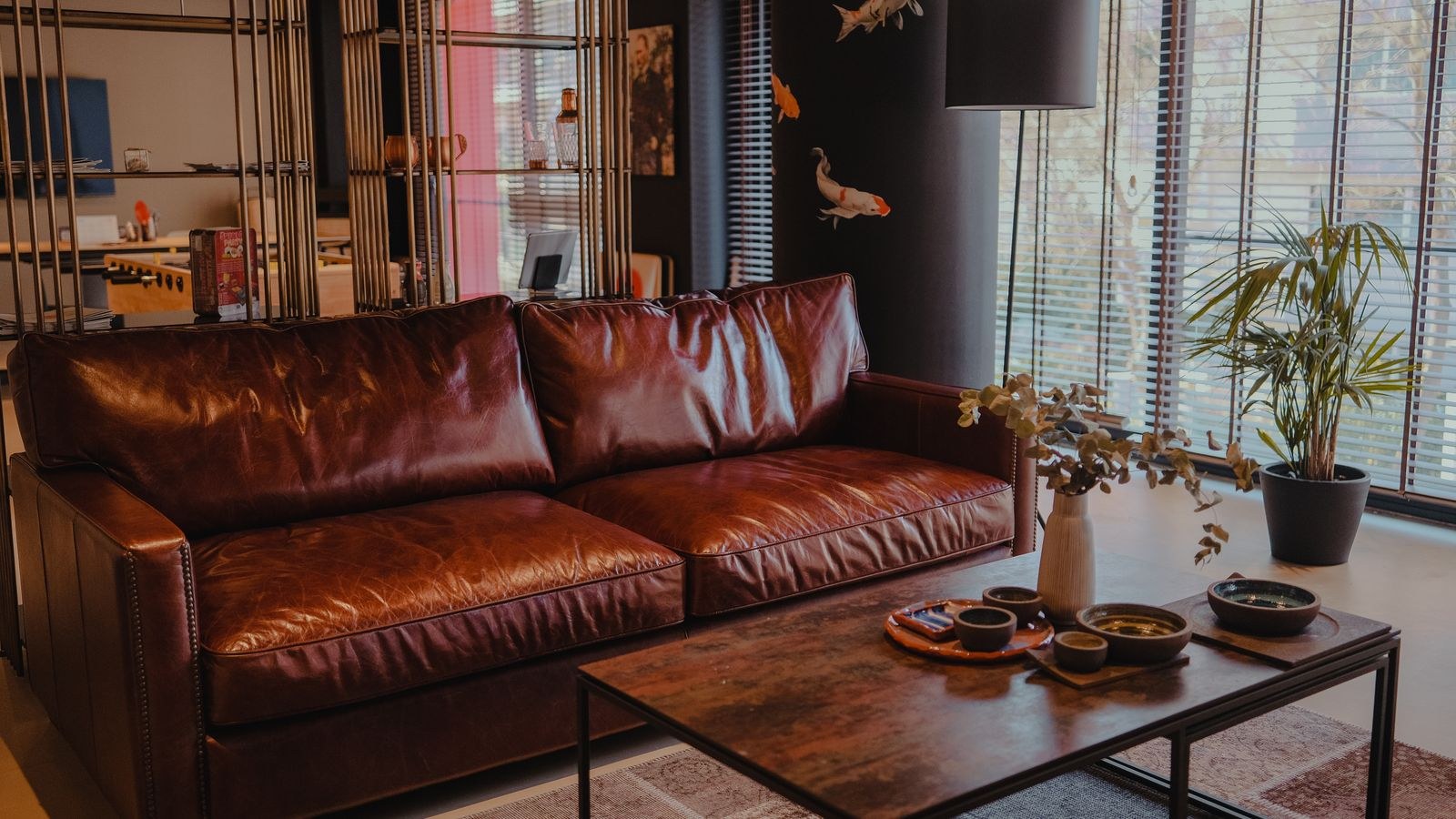 Cozy living room with a brown top-grain leather sofa and stylish decor