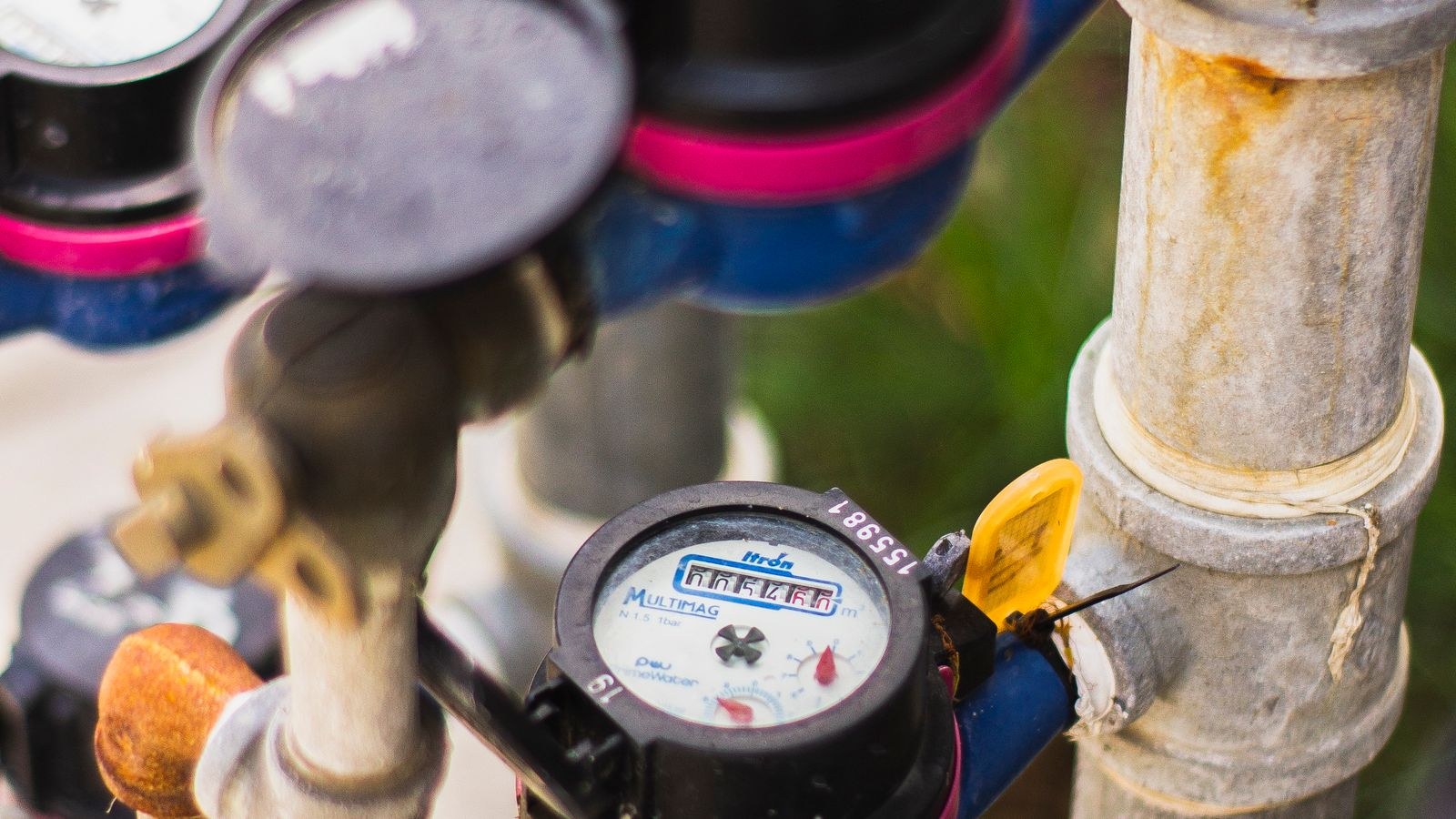 Water meters and supply pipes where a whole house water softener is installed