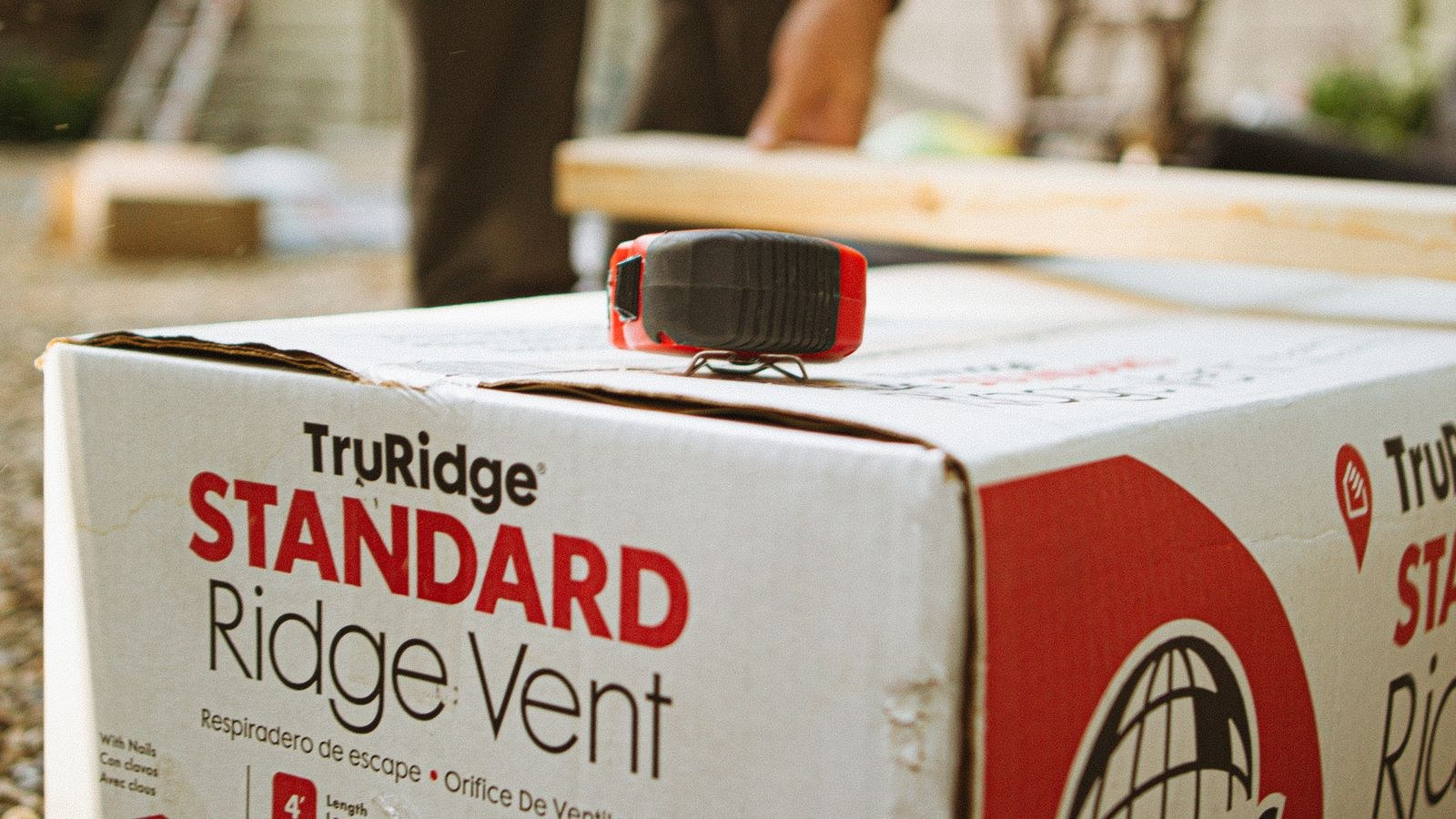 Ridge vent components and tools prepared for attic ventilation installation