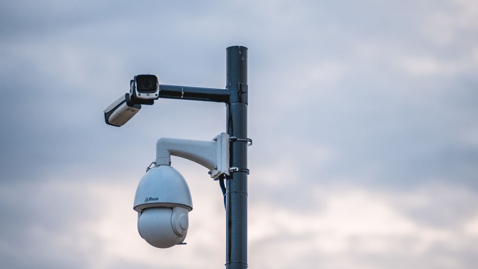 Indoor wireless surveillance camera monitoring a living room